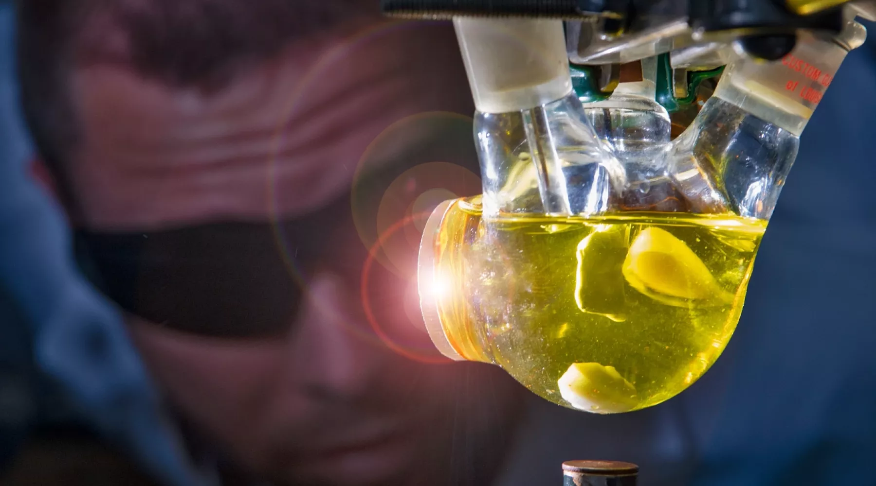 Close-up of a researcher in a lab working
