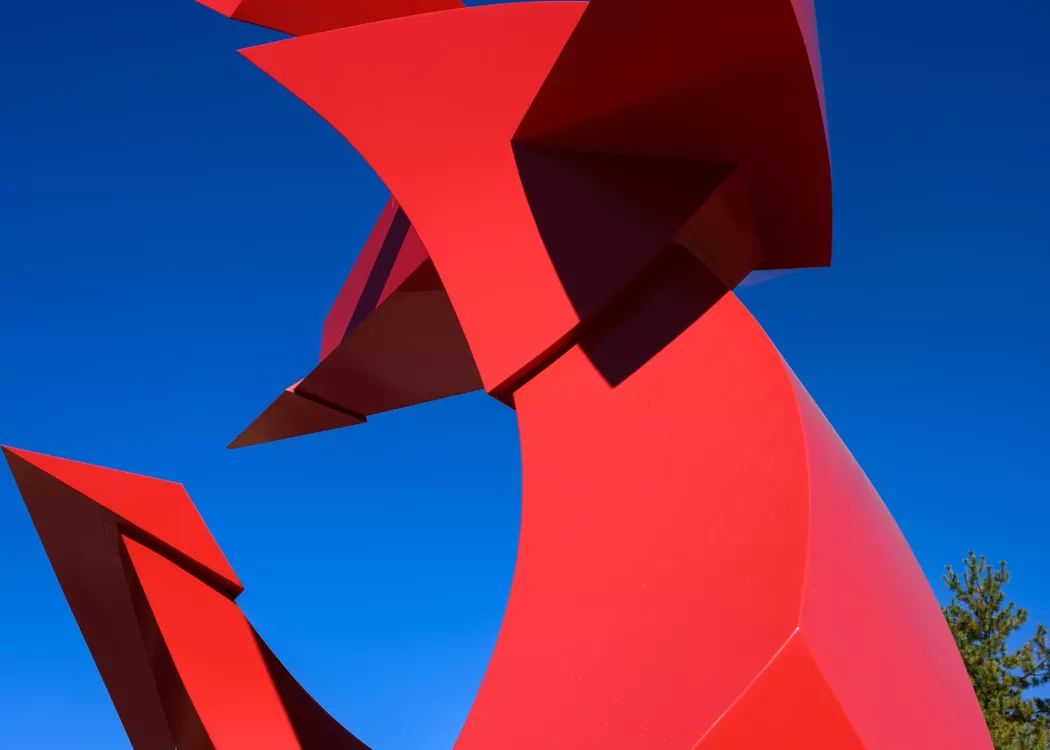 Close-up detail at an angle of the Big Red sculpture