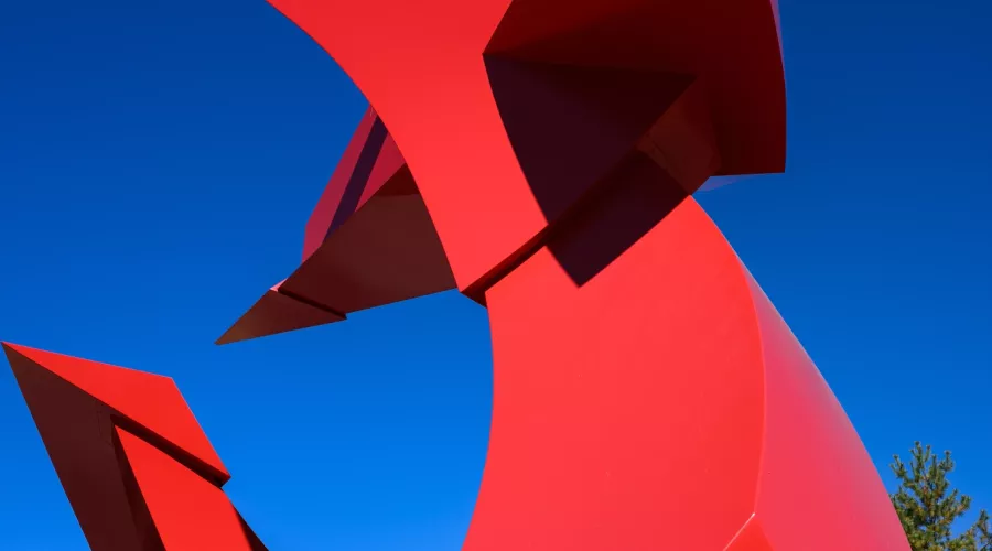 Close-up detail at an angle of the Big Red sculpture